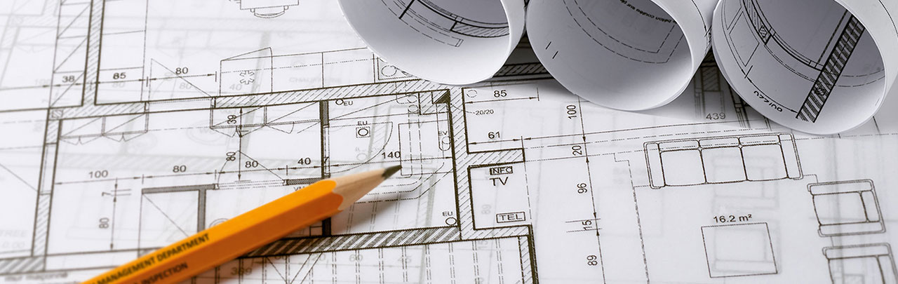 building plans laid out on a work surface