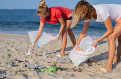 Stock Volunteers Beach Clean Up